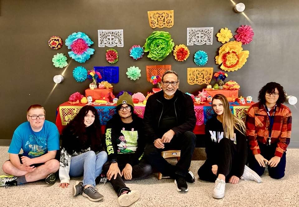 Students posing for camera at day of the dead celebration.